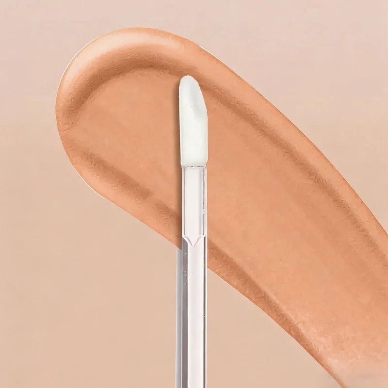 Charlotte Tilbury Softening Essence Concealer Honey Brightening in The Face Covering Spots Covering Dark Circles Under The Eyes