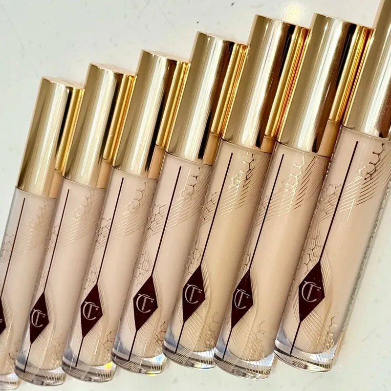 Charlotte Tilbury Softening Essence Concealer Honey Brightening in The Face Covering Spots Covering Dark Circles Under The Eyes